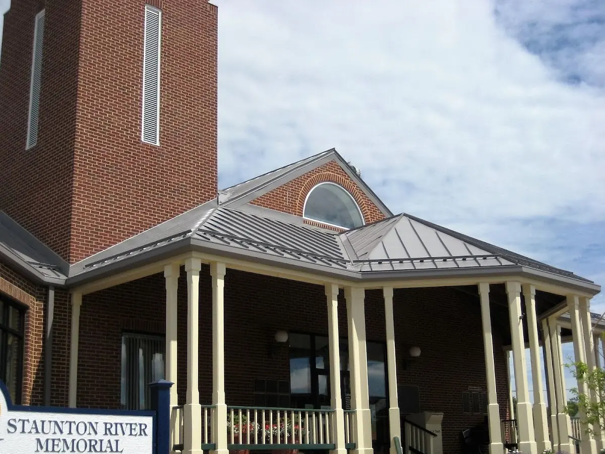 Skilled roofing craftsmen working on a residential roof in Evansville
